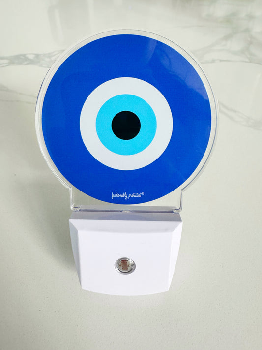 Evil Eye Glow Sensor Plug In Light