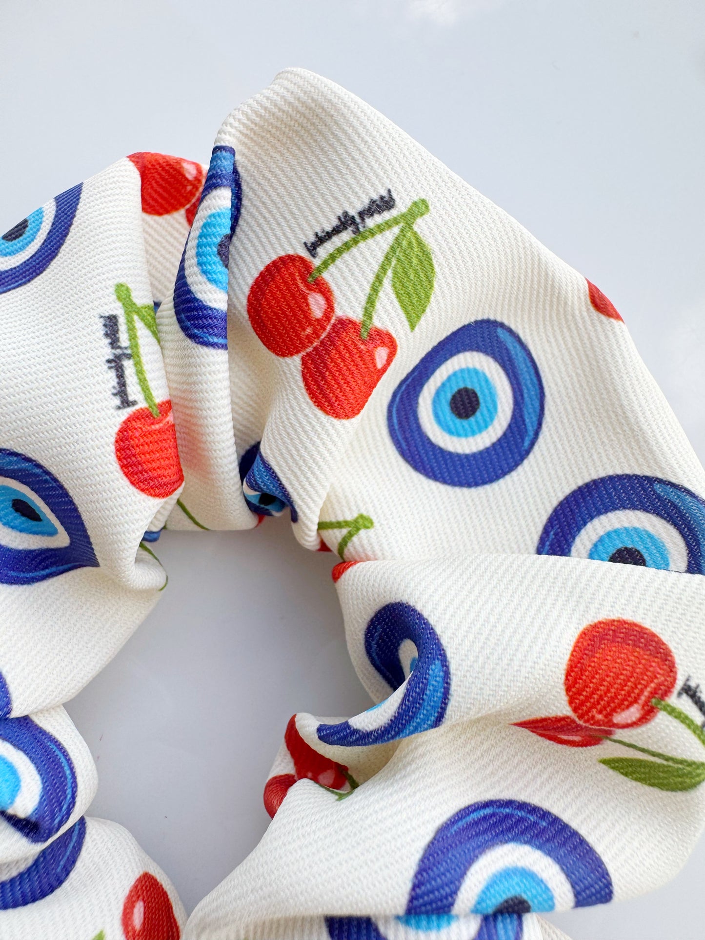 Cherry Evil Eye Seamless Scrunchie