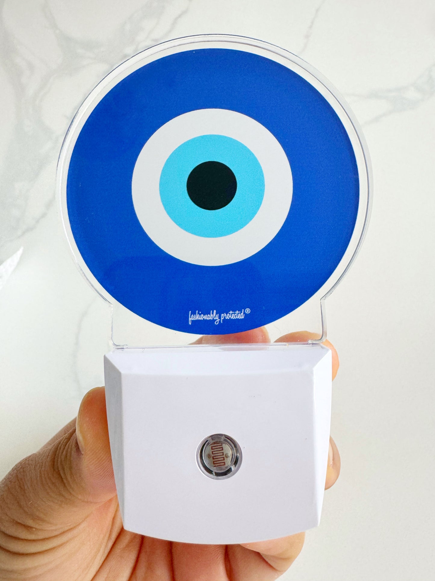 Evil Eye Glow Sensor Plug In Light