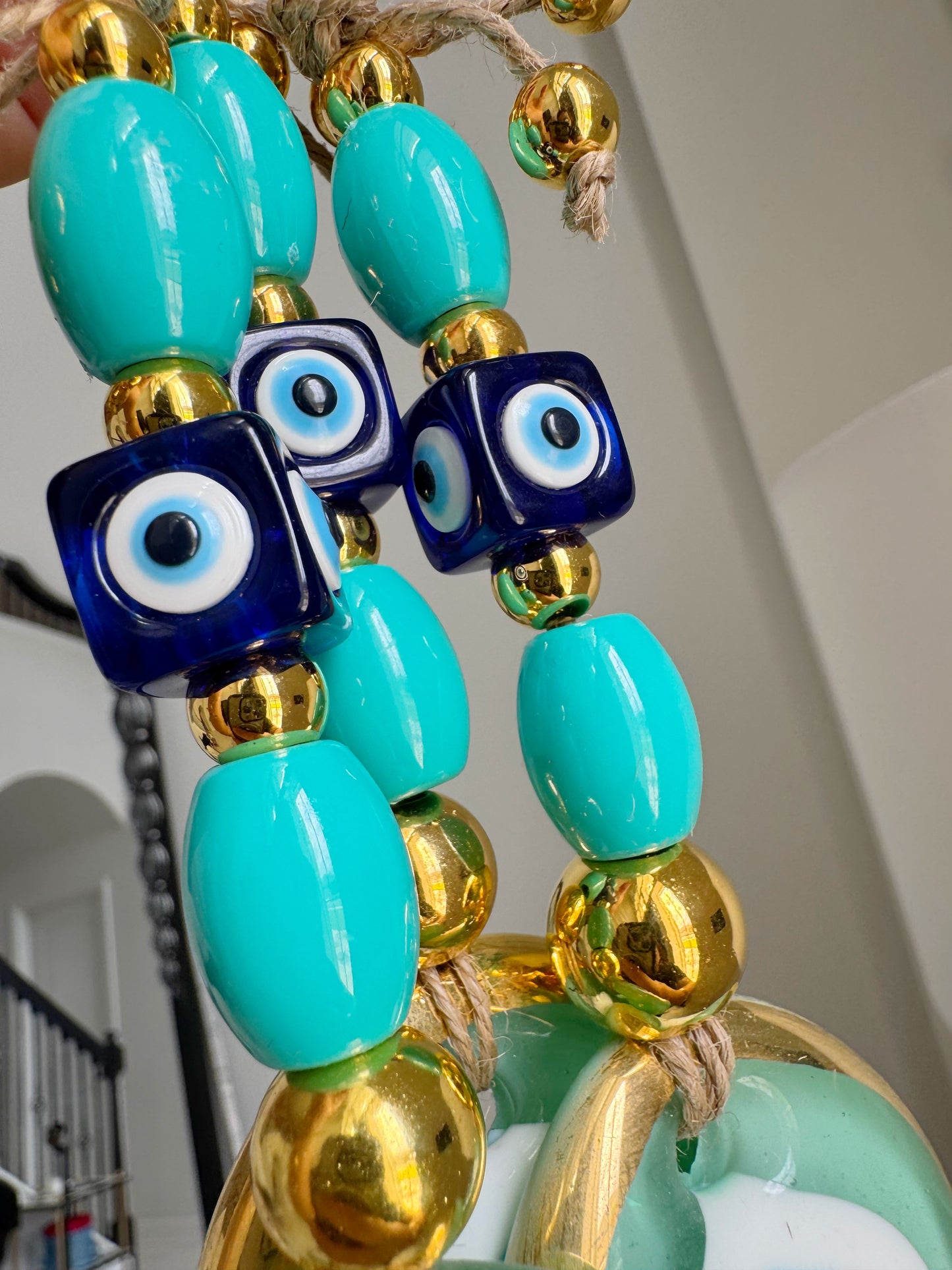 Limited Edition Gold Brushed Green Evil Eye Amulet wall decor