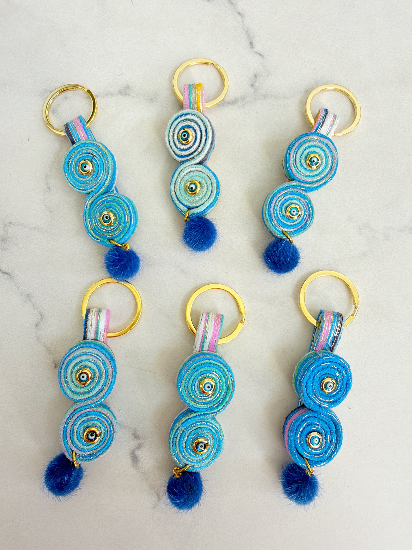 Handcrafted Evil Eye Keychain | Original Fiber Art Bag Charm with Blue Pom Pom