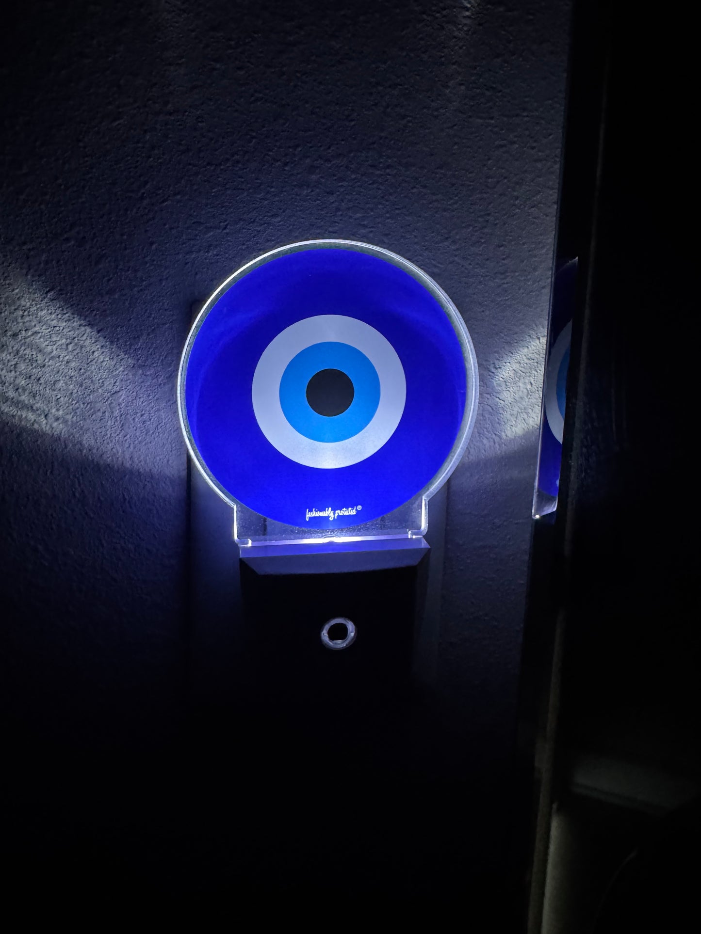 Evil Eye Glow Sensor Plug In Light