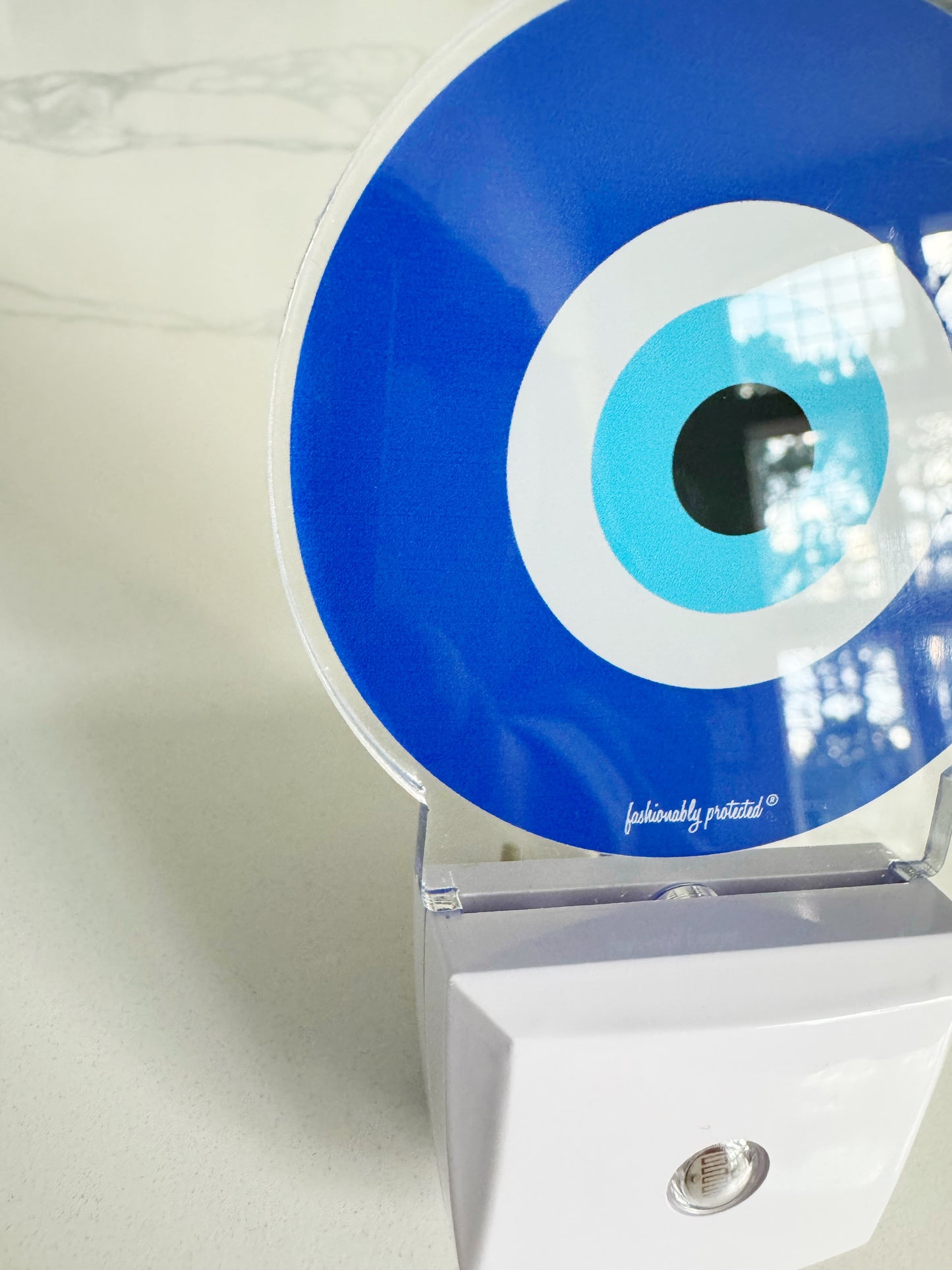 Evil Eye Glow Sensor Plug In Light