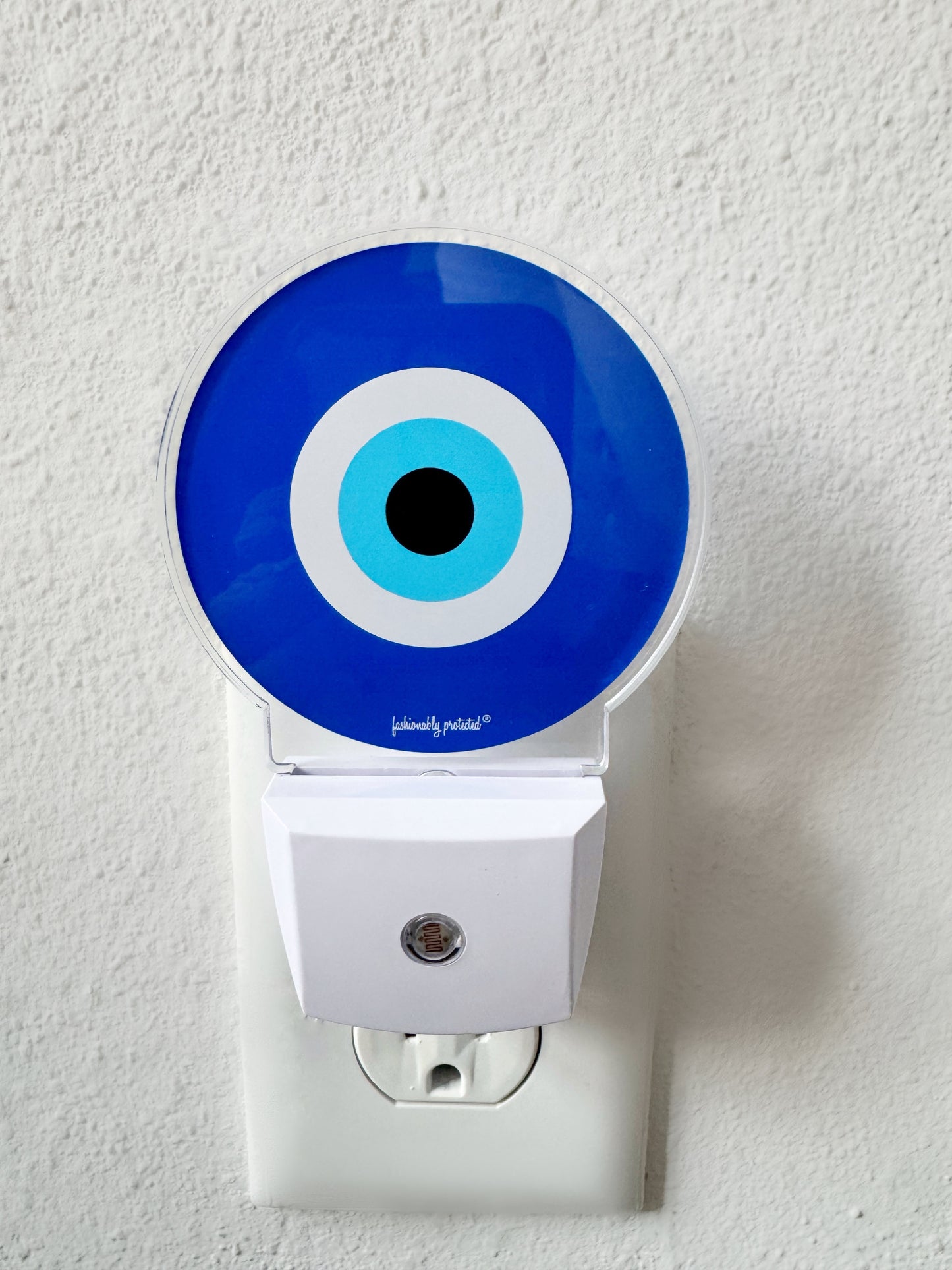 Evil Eye Glow Sensor Plug In Light