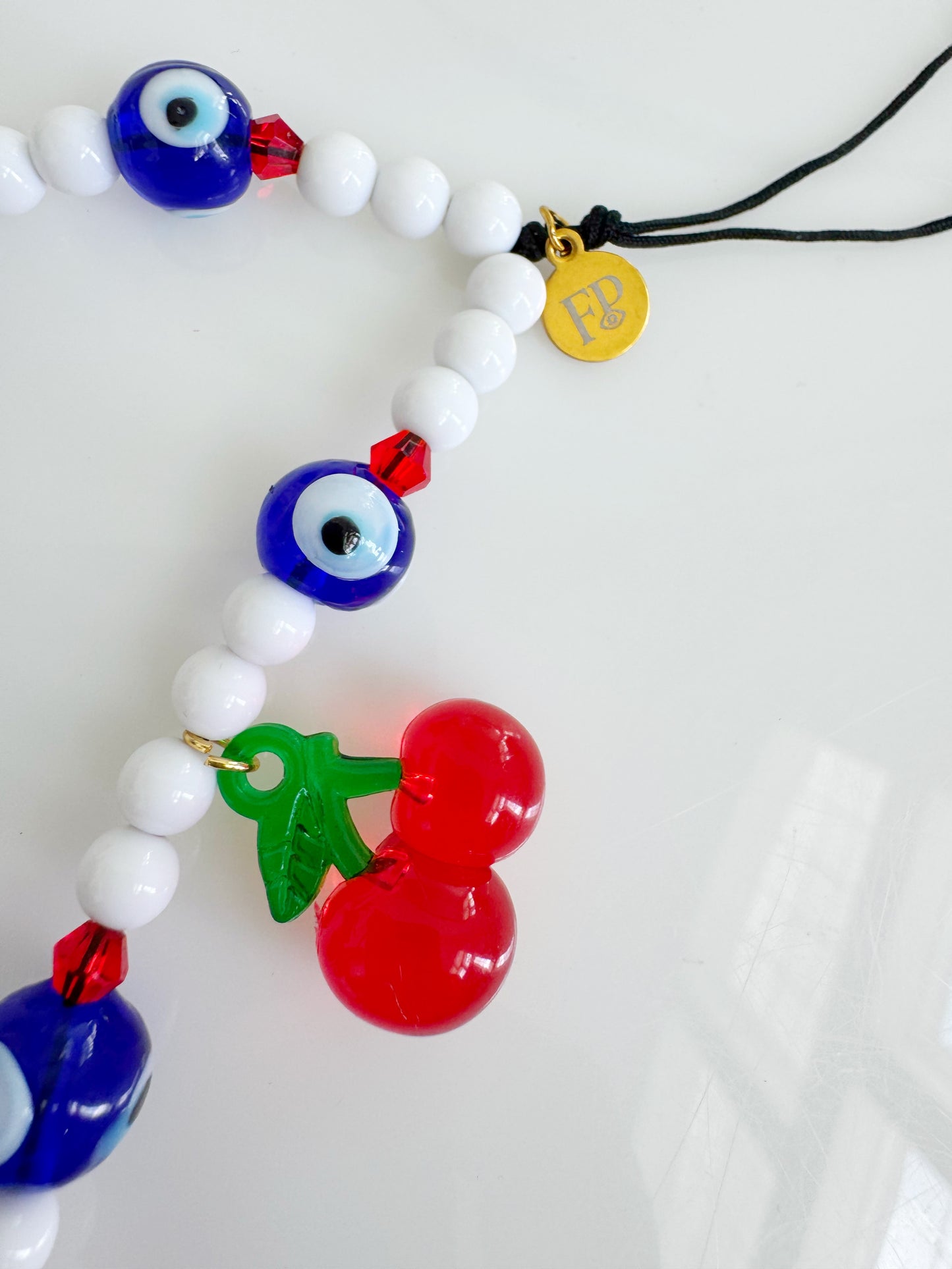 Limited Edition Cherry Drop Evil Eye Phone Strap