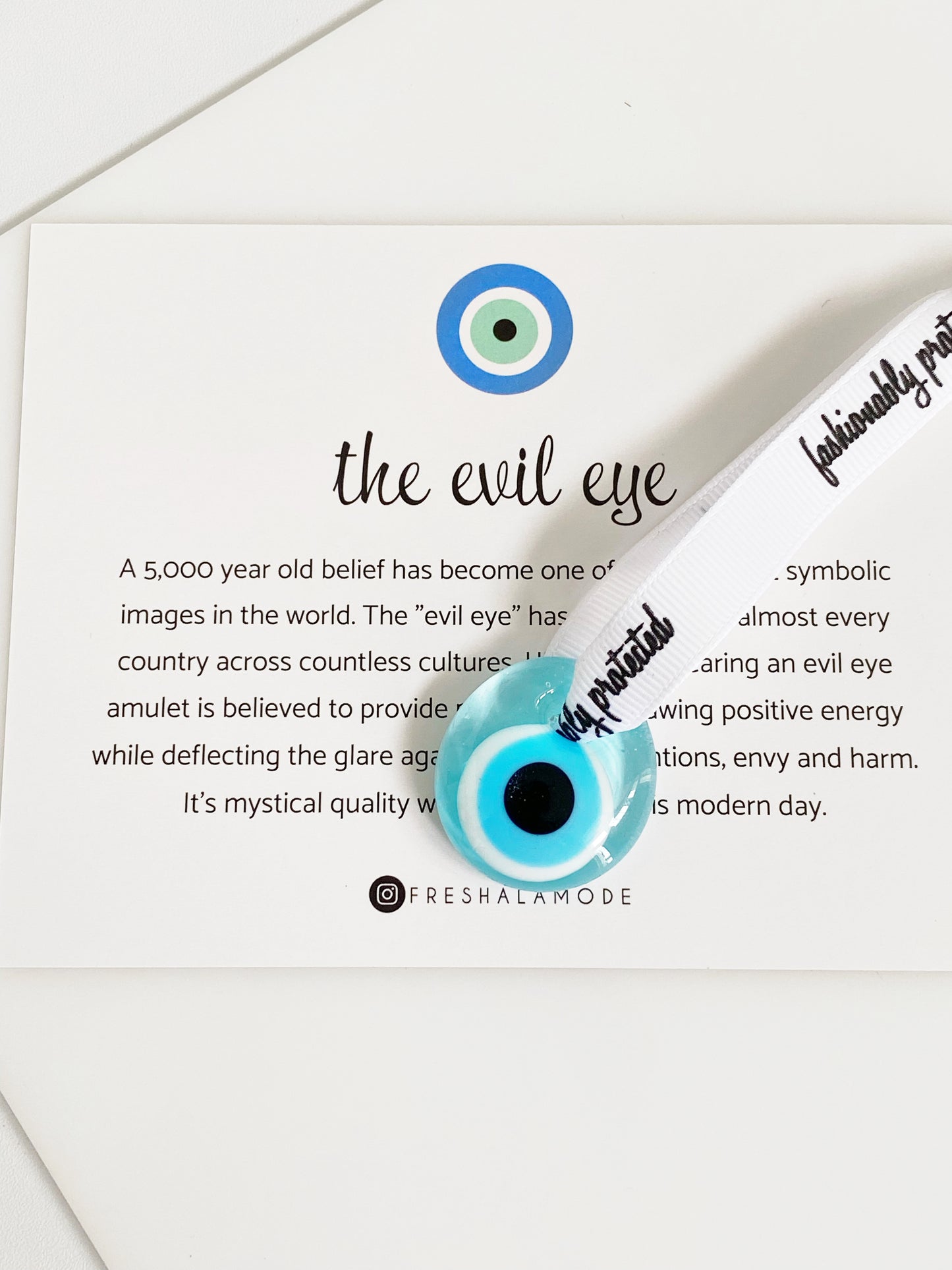 Baby Blue Evil Eye Glass Amulet