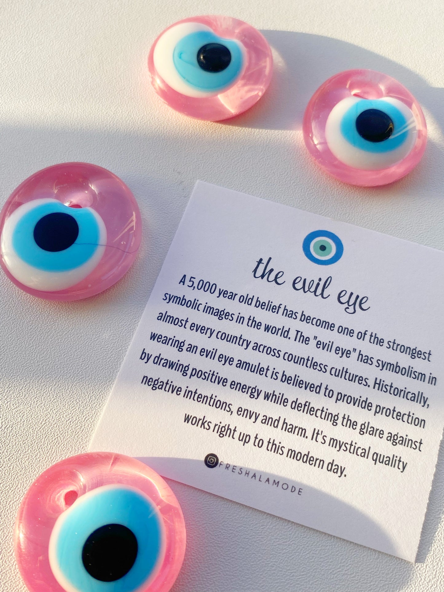 EXCLUSIVE! Pink Evil Eye Glass Amulet